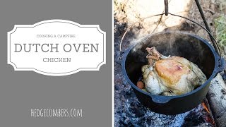 Cooking a Dutch Oven Chicken over a campfire [upl. by Vaenfila719]