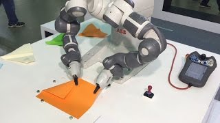 DualArm Collaborative YuMi Robot makes paper aeroplanes  ABB Robotics [upl. by Berhley]