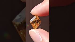 A brilliant and rare scheelite gemstone cut in a rhombus shape gem scheelite crystals [upl. by Baerman]