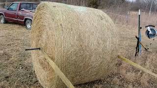 Using the homemade hay unroller Pt 2 [upl. by Jacquie]