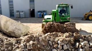 MB Crusher Bucket on a Merlo Telehandler [upl. by Ennaillij]