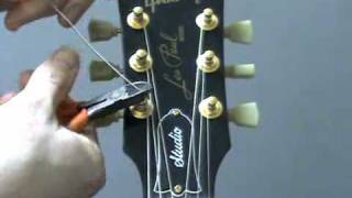 How to re string a guitar [upl. by Desai675]