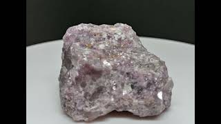 Lepidolite is the name of a rare lithiumrich mica mineral that is usually pink red or purple [upl. by Bebe]