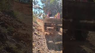 Widening a steep driveway with the tractor and moving rocks tractor [upl. by Lada467]