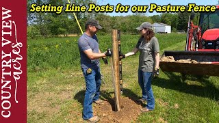 Installing Line posts and Bottom Barb Wire on our new Pasture Fence [upl. by Auoh814]