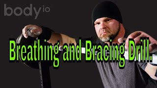 Breathing and bracing drills abdominal bracing powerlifting program Mike Robertson [upl. by Nerej540]