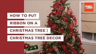 How to Put Ribbon on a Christmas Tree  Christmas Tree Decor  Hobby Lobby® [upl. by Aroc]