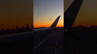 NYC Skyline Silhouette from Plane Window 🌅✈️ NYC SkylineSunrise PlaneTakeoff [upl. by Niall737]