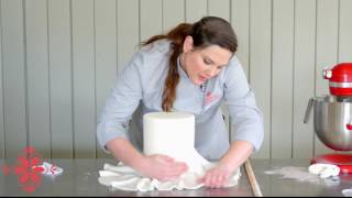 Covering A DoubleBarrel Cake With Fondant [upl. by Ollehcram396]