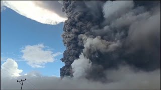 Smoke and ash billows from Indonesia volcano [upl. by Noled547]