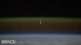 Whoa Comet and unidentified satellite seen from space in amazing timelapse [upl. by Einej58]