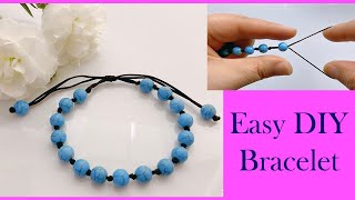 Friendship bracelet  How to make a bracelet Beads Charm Cord Thread String Good Luck Bracelet [upl. by Babara]