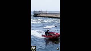 Saturn SD365 inflatable boat taking on a rough inlet [upl. by Rayshell790]