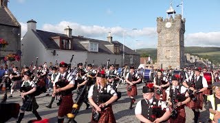 Massed Pipe Bands street parade after the 2019 Dufftown Highland Games in Moray Scotland [upl. by Anyak]