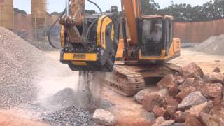 MB crusher bucket crushing basalt and granite [upl. by Erikson]