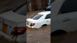 Car swept by flush floods in Nairobis Grogan garage Kenya [upl. by Shela]