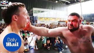 Men aggressively slap each other in Russian strength competition [upl. by Strauss]