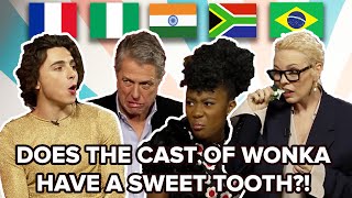 The Cast Of Wonka Try Sweets from Around The World [upl. by Nomma]