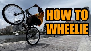 How To Wheelie Your Bike [upl. by Ingeberg]