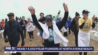 Thousands brave the frigid waters of Lake Michigan as part of the Polar Plunge [upl. by Surazal]