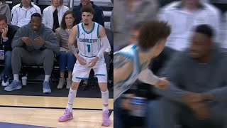 LaMelo Ball hits 3 and points at Thanasis for talking trash while courtside 😂 [upl. by Newra]