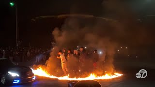 VIDEO Illegal Vallejo sideshow shows people in ring of fire as cars do donuts around them [upl. by Genesia979]