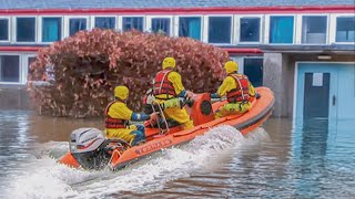 Heroic Rescue of Trapped Dog from Flooded School [upl. by Elle941]