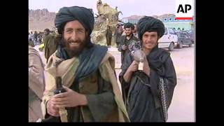 Afghan interim leader makes base in Mullah Omars compound [upl. by Ulyram]