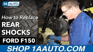 How To Replace Rear Shocks 9703 Ford F150 [upl. by Aniled]