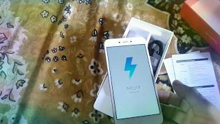 Unboxing Redmi 5A better than 10 or DTenor D amp first switch on amp installation of MIUI9 [upl. by Eillam]