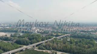 Dolly zoom Piacenza Italy Flight from the city Highway and industrial zone Po River Summer day [upl. by Burrus]