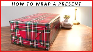 How To Wrap A Present  Simple Wrapping Paper Technique [upl. by Inuat]