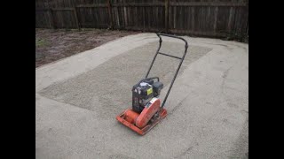 Plate compacting crushed gravel [upl. by Atinus409]