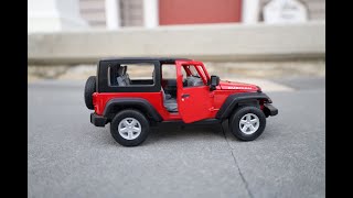 Unboxing of Jeep Wrangler Rubicon 124 Scale Diecast Model [upl. by Erb330]