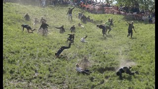 Thrills and spills as Cheese Rolling 2023 leads to MULTIPLE injuries in Gloucestershire UK [upl. by Constant]