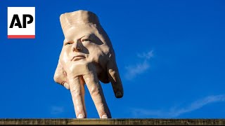 New Zealand city waves goodbye to disturbing hand sculpture after 5 years [upl. by Audrie]