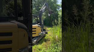 Removing cattails with the deere50g and weedoo [upl. by Arne348]