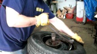 Coats 1010 Tire Changer Mounting Tire [upl. by Margarete625]