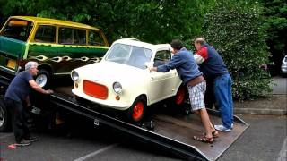 The Vespa 400 microcar gets loaded [upl. by Crosse]