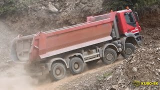 IVECO Trakker 8x8 dump truck  driving at the quarry [upl. by Ardine137]