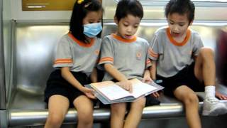 Justin and schoolmates singing HKUGAPS School song in MTR 20111011 [upl. by Nidnal]