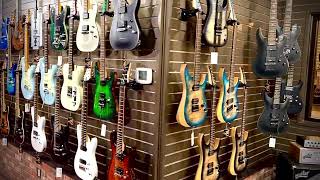 Guitarworks showing off their new Schecter display [upl. by Notyalk197]