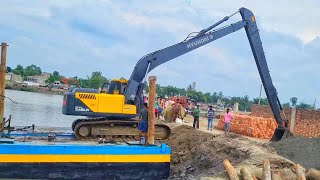 Excavator pontoon unloading HYUNDAI 245LR SMART long boom Machine cc [upl. by Eben]