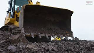 Bulldozer Pushing Stone at Ore Construction Site constructionmachinery excavator [upl. by Lalla]