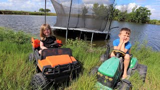 Using tractors on the farm to play in the water  Tractors for kids [upl. by Courtney]