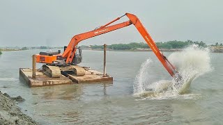 on pontoon Long Reach Excavator Digging The River TATA HITACHI EX215 Super long reach [upl. by Cerallua]