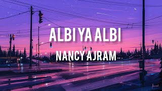 Albi Ya Albi Lirik Video NANCY AJRAM [upl. by Oneladgam]