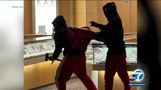 Smashandgrab robbers with hammers target Brea Mall jewelry store police say  ABC7 [upl. by Gomer]