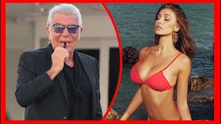 Roberto Cavalli vs Belen Rodriguez nuovo affondo dello stilista Scintille con la showgirl [upl. by Ynnek]