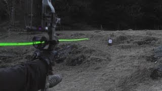 Shooting carbon arrows with lighted nocks from a compound bow [upl. by Lennaj701]